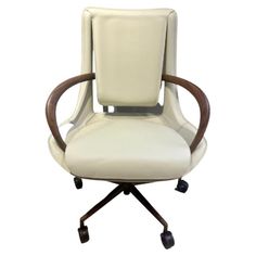 a white leather office chair with wooden arms