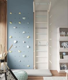 a child's room with blue walls and white ladders hanging on the wall