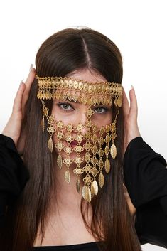 Embrace the allure of elegance with our handcrafted face veil, a statement piece that exudes bohemian charm. Meticulously fashioned from premium brass and bathed in sumptuous gold plating, this headpiece boasts a breathtaking array of detailed filigree patterns and delicate leaf accents that cascade gracefully below the eyes. Each element is designed to capture the light, creating a dance of luminosity with every movement. Adjustable for comfort, this headpiece promises a perfect fit, securing w Boho Headpiece, Face Veil, Hair Jewellery, Filigree Pattern, Event Inspiration, Leaf Design, Hair Jewelry, Things To Buy, Headpiece