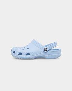 It’s the iconic clog that started a comfort revolution around the world! The irreverent go-to comfort shoe that you're sure to fall deeper in love with day after day. Crocs Classic Clogs offer lightweight Iconic Crocs Comfort™, a colour for every personality, and an ongoing invitation to be comfortable in your own shoes. Cop these today and finish off your 'fit strong. - Water-friendly and buoyant - Ventilation ports - Easy-clean, quick-drying - Pivoting heel straps - Customizable with Jibbitz™ Comfort Shoe, Crocs Classic Clogs, Blue Calcite, Culture Kings, Easy Clean, Strap Heels, Comfortable Shoes, Clogs, Light Blue