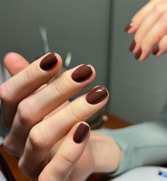 "Add a touch of sparkle to your early fall look with these glittery nail designs. ✨💅 Perfect for a night out or just to add some glam to your everyday style. #GlitterNails #SparkleSeason #NailGoals #FallFashion #NailArt #NailInspo #NailSwag #NailAddict #NailObsessed #FallNails" Nail Chocolate Color, Fall Nails Olive Skin, Black Nail Polish Short Nails, Fall Nails Super Short, Dark Brown Gel Nails Short, Short Nails Brown Color, Chocolate Brown Nail Polish, Chocolate Nail Color, Chocolate Color Nails