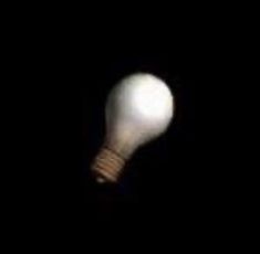 an image of a light bulb in the dark with no one around it or someone else