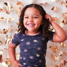 Get ready to light up the night with our Fireflies Pajama set! Made from ultra-soft bamboo fabric, these short sleeve PJs will keep your little ones cozy and snuggly all night long. Plus, the playful firefly print adds a touch of whimsy to their bedtime routine. 93% Bamboo; 7% Spandex Wash cold with like colors; stays soft wash after wash Fits snug; not treated with flame retardants Fun Short Sleeve Sleepwear For Sleepover, Fun Short Sleeve Loungewear Set, Cute Short Sleeve Tops For Bedtime, Playful Fitted Short Sleeve Sleepwear, Playful Short Sleeve Sleepwear For Playtime, Playful Short Sleeve Bedtime Sets, Fun Short Sleeve Bedtime Tops, Fitted Short Sleeve Sets For Bedtime, Fitted Short Sleeve Bedtime Sets