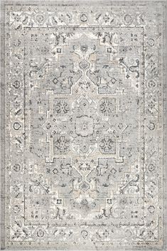 a gray and white rug with an intricate design