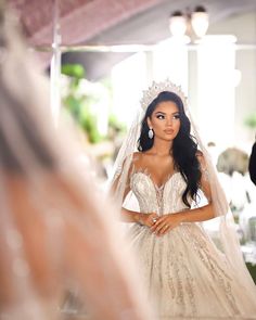 the bride is getting ready to walk down the aisle