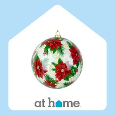 a christmas ornament with poinsettis on it