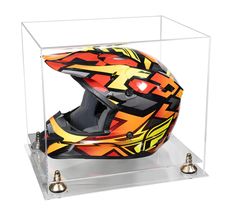 a helmet in a clear display case