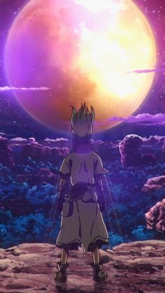 a man standing on top of a rocky hillside under a purple sky filled with stars