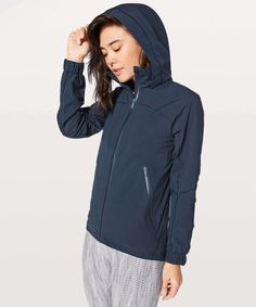 NWT Lululemon Here To Move Jacket ~SIZE:4~  True Navy&Pesto Don't let a little wet weather keep you from outdoor adventures. This waterproof jacket is seam-sealed so you can stay dry as you run, hike, or walk your dog in the rain. glyde waterproof Glyde Waterproof fabric is breathable and jacket is strategically seam-sealed to keep moisture out. waterproof features Designed for: Office Travel Commute Glyde: Waterproof Glyde fabric is seam-sealed to protect you from the rain. Stowable hood: Stowa Lululemon Outerwear For Outdoor Activities In Fall, Lululemon Long Sleeve Outerwear For Outdoor Activities, Lululemon Fall Outerwear For Outdoor Activities, Lululemon Sports Outerwear With Pockets, Casual Lululemon Hooded Outerwear, Lululemon Casual Hooded Outerwear, Casual Hooded Outerwear By Lululemon, Lululemon Hooded Outerwear For Outdoor Activities, Lululemon Long Sleeve Outdoor Outerwear