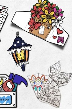 several different items that are on top of a piece of paper with flowers and hearts