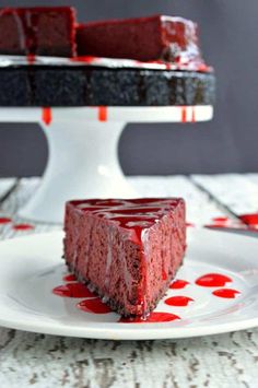 a piece of red velvet cake on a white plate