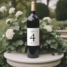 PRINTED Wine Table Numbers 1-10, Expandable Options Avail | Glossy Wedding Wine Table Numbers: Elevate Your Tablescape with Elegance and Practicality ---------------------- Description -------------------- Elevate the sophistication of your wedding tablescape with our glossy Wedding Wine Table Numbers. Crafted to perfection, these sleek table numbers adhere seamlessly to the bottles on your tables, adding an extra touch of elegance while serving as practical indicators for your guests. Each table number measures 3 inches in width and 4 inches in height (approximately 7.6 cm x 10.2 cm), making them the perfect size to stand out without overpowering your decor. Starting with a set of 10 table numbers, these glossy wine table numbers are available in customizable quantities to suit the size o Wine Table Numbers, Wedding Wine Table, Wedding Tablescape, Wine Table, Wedding Wine, Wine Wedding, Wedding Tablescapes, Wedding Table Numbers, Dining Table Decor