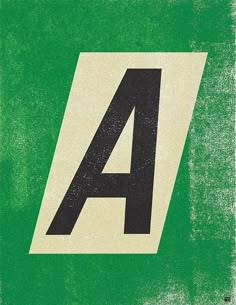 the letter a is written in black and white on a green background with an arrow