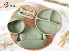 personalized baby feeding set with spoons and utensils on jute mat