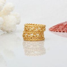 "Love the layered chain look? Now you can wear it on your finger! We offer multiple styles of chain rings that you can mix and match to create a look perfect for you! Buy multiples and stack them to create multiple looks for different occasions. All rings are rigid - they look like chains but are solid metal. This option is for gold rings but we also have chain rings in sterling silver as well. Please see this listing: https://www.etsy.com/listing/1301482567 ♥♥ HOW TO ORDER ♥♥ 1. In the dropdown Gold Stackable Rings, Chain Ring Gold, Design Your Own Ring, Chain Rings, Layered Chain, Gold Rings Stackable, Ring Chain, Handmade Rings, Minimalist Rings