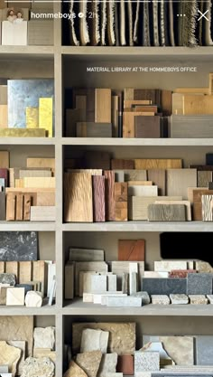 a book shelf filled with lots of different types of wood