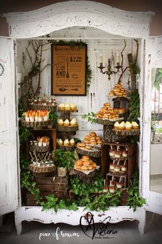 a table filled with pastries and desserts