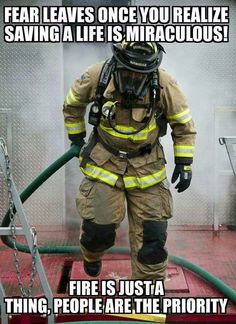 a firefighter is standing in front of a ladder with the caption, fear leaves once you relize saving a life is miraculousous