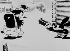 mickey and minnie in the snow with an old fashioned camera on their lapset, looking at each other