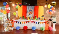 a birthday party with balloons and decorations