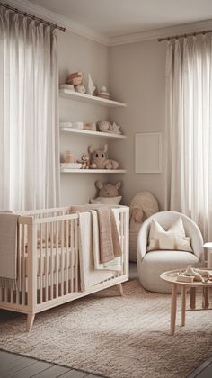 a baby's room with white furniture and curtains