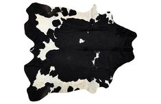 The cowhide is a classic design element, lending inherently beautiful style to any setting. This rug is handcrafted from a black-and-white hide. Living Dining Room Combo, White Room Decor, Hide Rug, Exotic Fashion, Rug Black, Beautiful Style, Contemporary Rugs, Black Denim Shorts, One Kings Lane