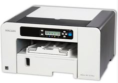 a printer that is sitting in front of a white background with the word ricor on it