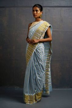 Sky blue handwoven kasavu saree featuring stripe pattern all over with golden border. Comes with unstitched blouse piece. - Aza Fashions Handloom Traditional Wear For Reception And Festivals, Handloom Traditional Wear For Receptions And Festivals, Handloom Traditional Wear For Festivals And Receptions, Handloom Dupatta For Diwali Reception, Handloom Dupatta For Reception And Diwali, Traditional Handloom Wear For Reception, Bollywood Style Handloom Dupatta For Reception, Handloom Traditional Wear For Diwali Reception, Handloom Dupatta For Reception With Traditional Drape