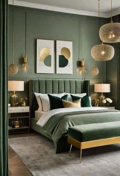 a bedroom with green walls, gold accents and two lamps hanging from the ceiling above the bed