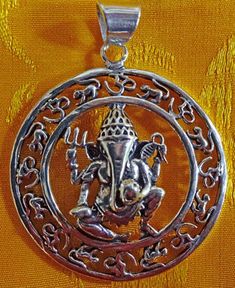 Ganesha with Om circle Pendant. Size: 1.5" diameter pendant. Made from beautiful brass. Symbolic Jewelry For Festivals, Round Coin Pendant Jewelry For Festivals, Round Festival Coin Pendant Jewelry, Festival Coin Pendant Jewelry, Round Festival Necklaces With Large Pendant, Festival Jewelry With Large Round Pendant, Om Pendant, Buddhist Prayer, Prayer Flags