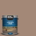 a can of behr premium concrete stain on a dark gray background with the words, concrete