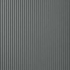 a gray wall with vertical lines on it