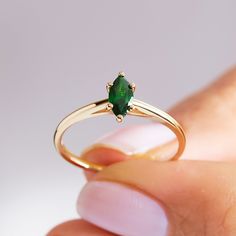 "Here is our Marquise Cut Emerald Ring for Bride! This Dainty Birthstone Engagement Band will be perfect gift for her wedding or engagement ceremony. This Unique Wedding Ring can be switched with her birthstone and you can create 14K gold custom ring! This Green Gemstone Ring will be great Promising Jewelry in her bridal shower! Are you looking for birthmonth jewelry, here is the perfect marquise ring seting for women, girl friend, future wife or for yourself. This Unique unique wedding ring can be either Exciting Promise Ring or Engagement Ring with her birth month stone or your wedding month stone. This Sturdy personalized band has love & serves as a perfect gift for Newlywed & Fiance as well! You can check our other engagement ring in here: https://www.etsy.com/shop/Cristojuanna?ref=sel Emerald Marquise Promise Ring For May Birthstone, Marquise Emerald Ring For Promise In May, Fine Jewelry Marquise Emerald Promise Ring, 14k Gold Marquise Cut Emerald Ring, Marquise Cut Emerald Promise Ring, Gold Marquise Emerald Ring With Prong Setting, 14k Gold Marquise Emerald Ring With Prong Setting, Marquise Emerald Ring In 14k Gold With Prong Setting, Marquise Emerald Ring In 14k Gold