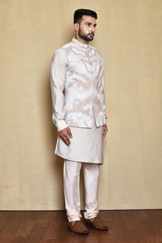 Cream abstract pattern embroidered bundi. Comes with white asymmetric hem cut kurta and churidar. - Aza Fashions Kurta Patterns, Kurta Set For Men, Nehru Jackets, Cream Silk, Churidar, Kurta Set, Embroidered Silk, Asymmetric Hem, Aza Fashion