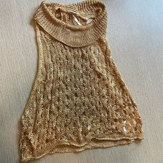 Size Small Gold Mesh Loose Fitting Top. Would Be Cute With A Bathing Suit. Never Worn Out. One Size Sleeveless Casual Tops, Loose Fitting Tops, Free People Tops, Bathing Suit, Mesh Top, Bathing Suits, Tunic Tops, Free People, Loose Fitting