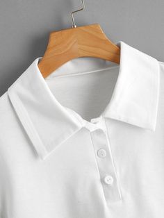 📦FREE Shipping on orders over $80 Style: Casual Color: White Pattern Type: Plain Neckline: Polo Length: Crop Details: Button Front Sleeve Length: Short Sleeve Sleeve Type: Regular Sleeve Season: Summer Fit Type: Regular Fit Sheer: No Material: Polyester Composition: 65% Polyester, 35% Cotton Fabric: Slight Stretch Solid Color Polo Collar Top With Buttons, White Button-up Plain Top, White Plain Button-up Top, White Polo Shirt With Buttons, White Collared T-shirt With Buttons, White Polo Collar Top With Buttons, White Tops With Button Closure And Collar, White Top With Button Closure And Collar, White Collared Top With Button Closure