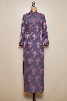 1960's Cheongsam Silk Dress. In Excellent Vintage Condition. Clean and Ready to Wear.  -No Label -Fits Like an X-Small/Small -Fabric: Jacquard, Lined: Acetate -Silk or Rayon Blend  -Fully Lined -Original Talon Zipper at side seam -Snap closure at bodice -2 Snap Closure at wrist -Mandarin Collar -Collar 12" Circumference  -2 Frog Closure  -Small Neck Opening -Bracelet Length Sleeve -Contrast Binding  -21" Side Seam Slits on Both Sides -No Flaws to Note   Measurements:  Bust: 33-34" Waist: 26.5" Hips: 34-35" Total Length (shoulder to Hem): 51" Sleeve Length: 19.5"  Sleeve Inseam: 14.5" Fitted Long Sleeve Brocade Dress, Fitted Silk Long Sleeve Ao Dai, Fitted Long Sleeve Cheongsam For Evening, Fitted Silk Ao Dai With Long Sleeves, Frog Closure, Cheongsam Dress, Cheongsam, Mandarin Collar, Dress Clothes For Women