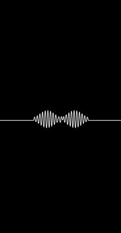 a black and white photo of an audio wave