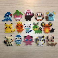 a bunch of pixelated animals sitting on top of a table