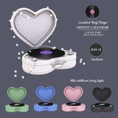 an old record player with several different colors and shapes, including hearts on the cover