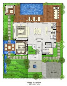 the floor plan for a house with swimming pool and decking area, surrounded by green grass