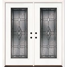 a white double door with glass panels