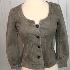 Ultra Feminine Denim Jacket. Nipped In Waist With Collarless Scoop Neck. 4 Buttons Down The Front; Seaming Detail All Around The Waistline. Picked Up At A Theory Sale, This Is Labeled As 1 Size. I Would Estimate At 2 Or 4. Measures Flat Across Front Armpit To Armpit 16”. Flat Across Waist About 15” Shoulder To Hem Is About 20”. Shoulder To Wrist Is 20”. Color Is A Greenish Gray And The Color Is Intentionally Uneven With Lighter And Dark Spots. Originally $390 Chic Fitted Denim Jacket With Long Sleeves, Fitted Washed Outerwear For Work, Chic Fitted Denim Jacket With Snap Buttons, Fitted Long Sleeve Denim Jacket With Snap Buttons, Fitted Washed Outerwear With Long Sleeves, Fitted Button-up Washed Outerwear, Fitted Washed Denim Jacket For Work, Fitted Chic Denim Jacket For Fall, Chic Fitted Denim Jacket For Fall