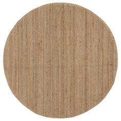 a round rug with an oval pattern on the top and bottom, in beige tones