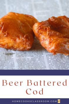 two pastries sitting on top of a newspaper with the words beer battered god above them