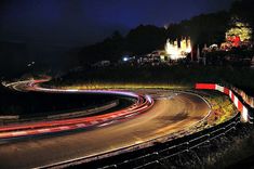 a long exposure shot of a highway at night