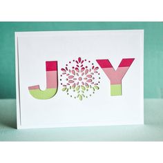 a card with the word joy on it