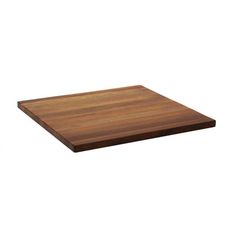 a wooden cutting board sitting on top of a table