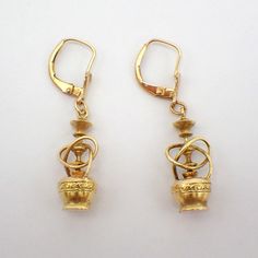 Vintage 14k (.585) yellow gold figural drop earrings in form of a hookah. These catchy earrings are 38 mm long (including the hook), 10.5 mm wide, weighing a total 5.6 grams. EA3486 Gold Lever Back Earrings For Gift, Gold Lever Back Earrings For Formal Occasions, 14k Gold Dangle Earrings With French Hook, Formal Gold Lever Back Earrings, 14k Gold Dangle Earrings With Lever Back, Yellow Gold Dangle Earrings With Lever Back, Gold Lever Back Earrings, 14k Gold Lever Back Earrings, Antique Dangle Earrings With Lever Back