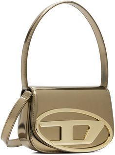 Polished leather shoulder bag in metallic bronze tone. · Fixed carry handle · Adjustable and detachable crossbody strap · Logo hardware at face · Magnetic press-stud flap · Patch pocket at two-compartment interior · Twill lining · H5.5 x W8 x D2.25 Supplier color: Bronze Designer Gold Shoulder Bag With Logo Hardware, Modern Silver Shoulder Bag With Logo Hardware, Gold Crossbody Bag With Logo Hardware, Designer Gold Flap Bag With Detachable Handle, Silver Bags With Logo Hardware For Formal Occasions, Formal Silver Bags With Logo Hardware, Tan Top Handle Shoulder Bag With Logo Hardware, Evening Flap Shoulder Bag With Logo Hardware, Gold Bag With Logo Hardware